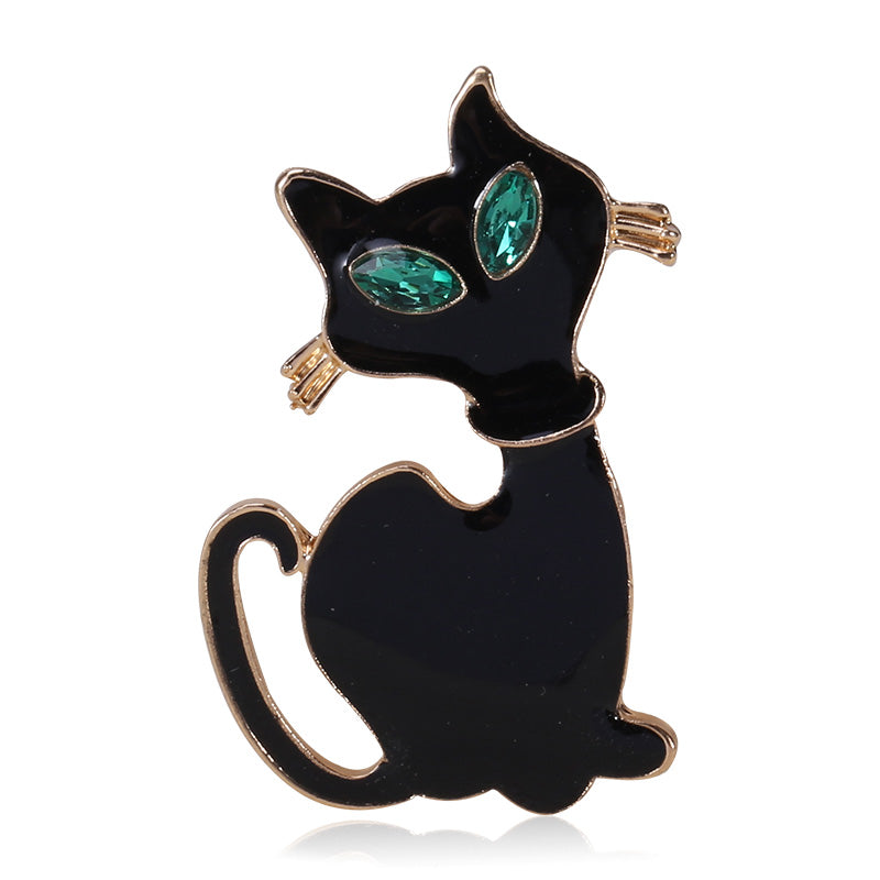 MayTree Brosche "schwarze Katze" mit grünem Strass